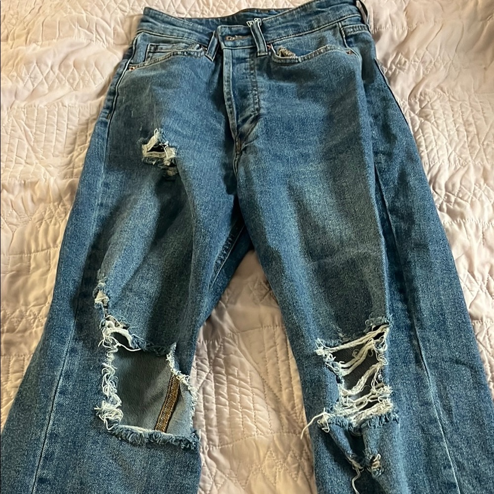 Woman’s Blue Distressed Jeans